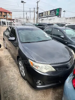 Toyota Camry SE Sport 4dr Sedan w/Prod. End 11/13 (2.5L 4cyl 6A) 2014
