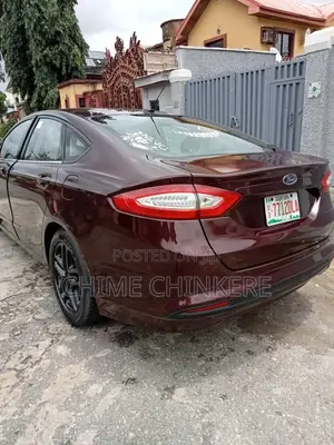 Ford Fusion Titanium 4dr Sedan AWD w/EcoBoost (2.0L 4cyl Turbo 6A) 2014