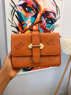 Burnt Orange Embossed Handbag With Gold-Tone Hardware