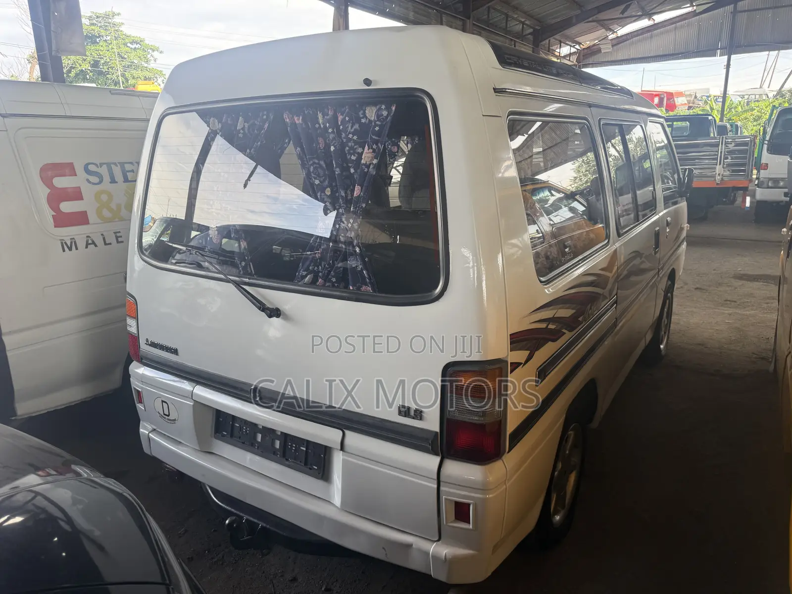 Mitsubishi L300 2010 White