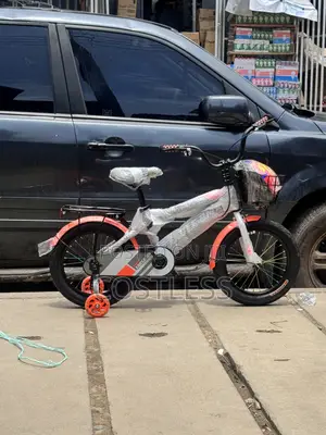 New Children's BMX-style Bicycle With Training Wheels and Front Basket