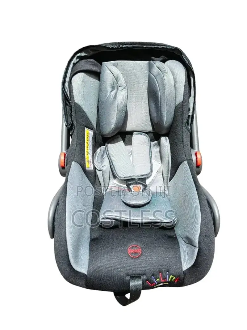 Infant Car Seat and Carrier With an Adjustable Handle