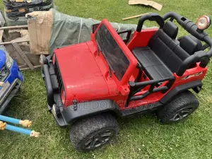Used Kids Electric Ride-on Jeep (Red 4x4)