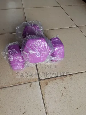 A Pair of 4kg Purple Hex Dumbbells