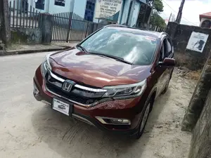Honda CR-V Touring 4dr SUV AWD (2.4L 4cyl CVT) 2015 Brown