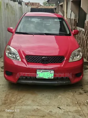 Toyota Matrix XR Hatchback FWD (1.8L 4cyl 4A) 2006 Red