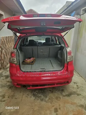 Toyota Matrix XR Hatchback FWD (1.8L 4cyl 4A) 2006 Red
