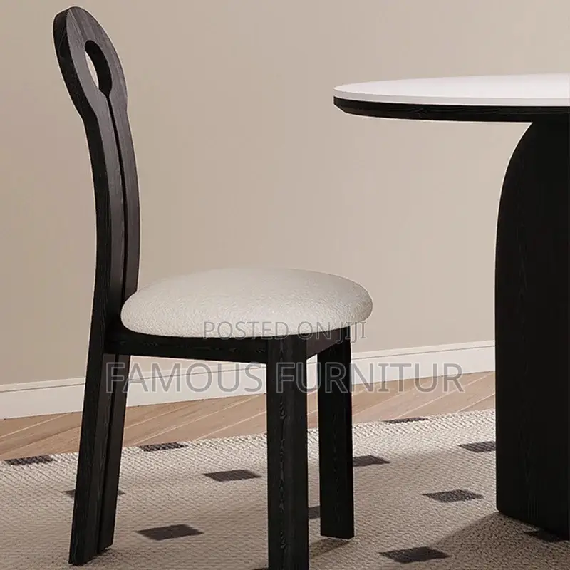 Modern Black Round Dining Set With White Boucle-Upholstered Chairs