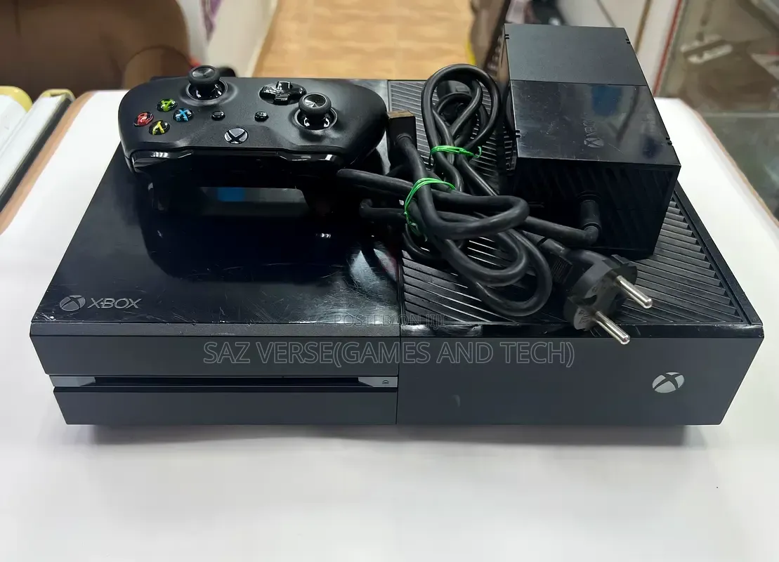Xbox One With Controller and Included With Games