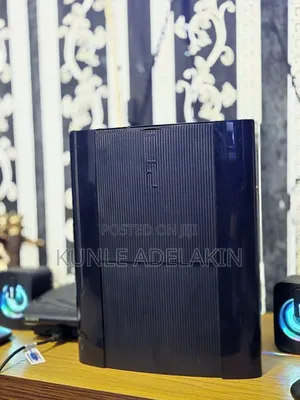 PS 3 Super Slim With 2 Pads and 5 Games