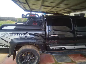 Toyota Tacoma V6 4dr Access Cab 4WD 6.1 ft. SB (4.0L 6cyl 6M) 2015