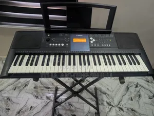 Yamaha PSR E333 Piano Keyboard With Stand