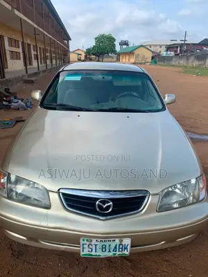 Mazda 626 LX 4dr Sedan (2.0L 4cyl 5M) 2002 Gold