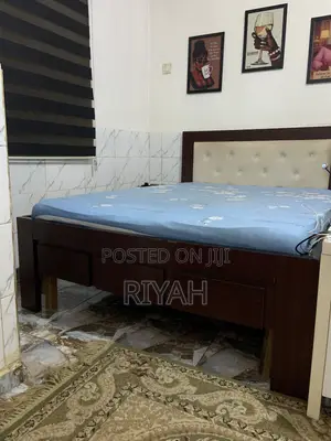 6 X 4.5 Brown Bed Frame With Cream Padded Headboard & Bedside Drawer