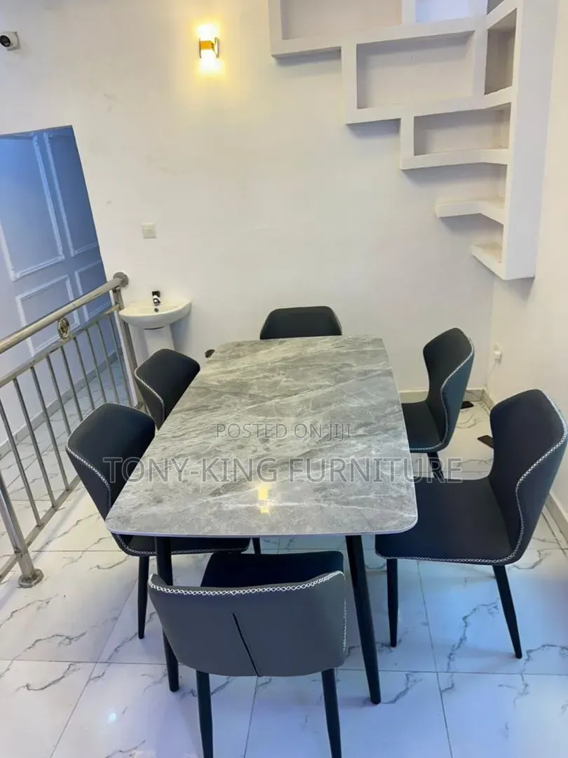 Modern 6-Seater Marble-Finish Rectangular Dining Set.