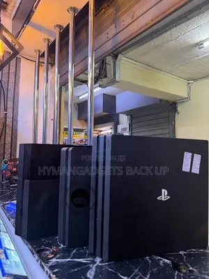 Super Neat UK Used PS 4 Pro With 2 Pads and Game