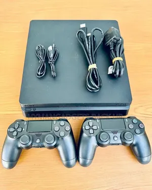 PS 4 Slim With 2 Pads and Game UK Used
