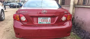 Toyota Corolla LE 4dr Sedan (1.8L 4 cyl 4A) 2009 Red