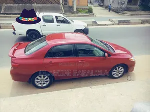 Toyota Corolla LE 4dr Sedan (1.8L 4cyl 4A) 2010 Red