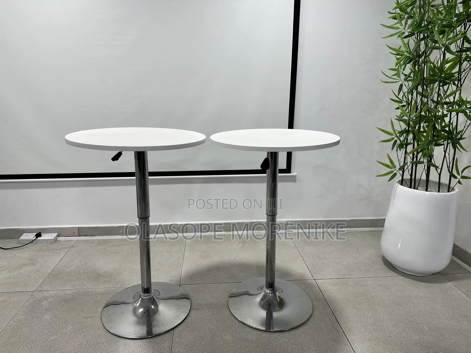 Two Mordern Adjustable Height Round Table