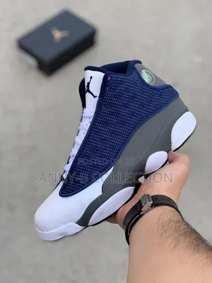 Blue and White Jordan 13 Retro Sneakers