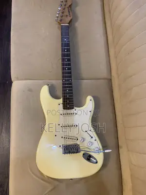 White Stratocaster Guitar