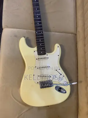White Stratocaster Guitar