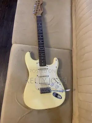 White Stratocaster Guitar