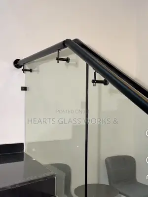 Frameless Glass Staircase Railing With Black Handrail