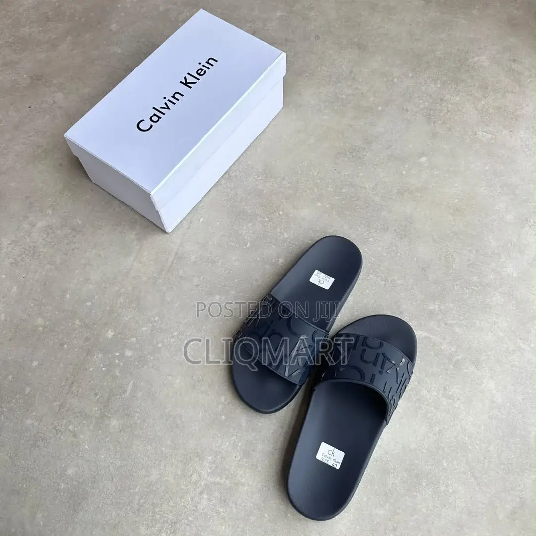 Calvin Klein Embossed Monogram Slider Sandals