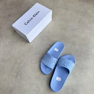 Calvin Klein Embossed Monogram Slider Sandals