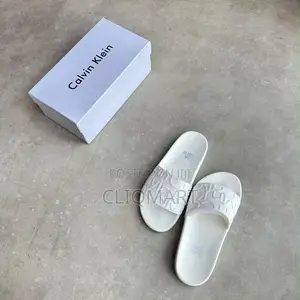 Calvin Klein Embossed Monogram Slider Sandals