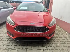 Ford Focus SE Hatchback FWD (1.0L 3cyl 5M) 2016 Red