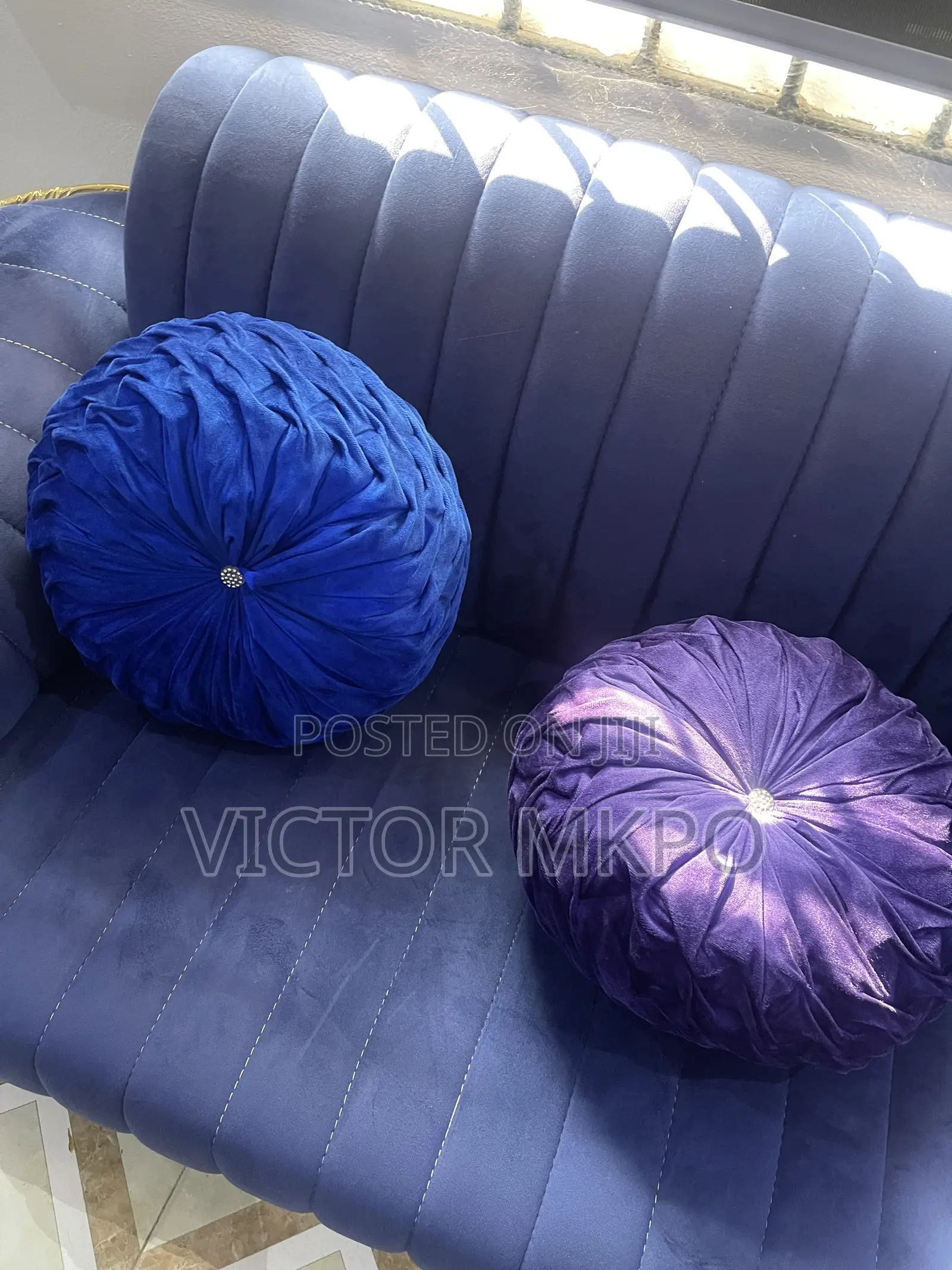 Medium Sized Sofa With 2 Throw Pillows