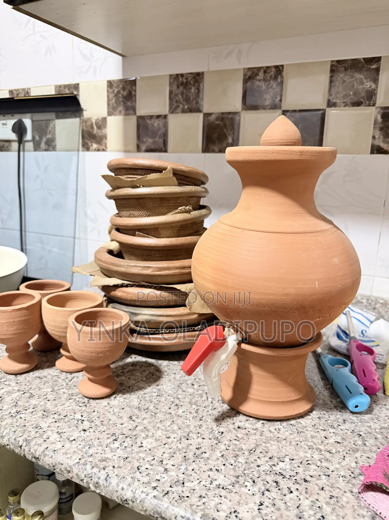 Clay Water Dispenser, Saucers and Cups