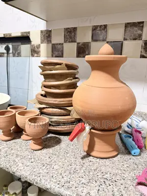 Clay Water Dispenser, Saucers and Cups