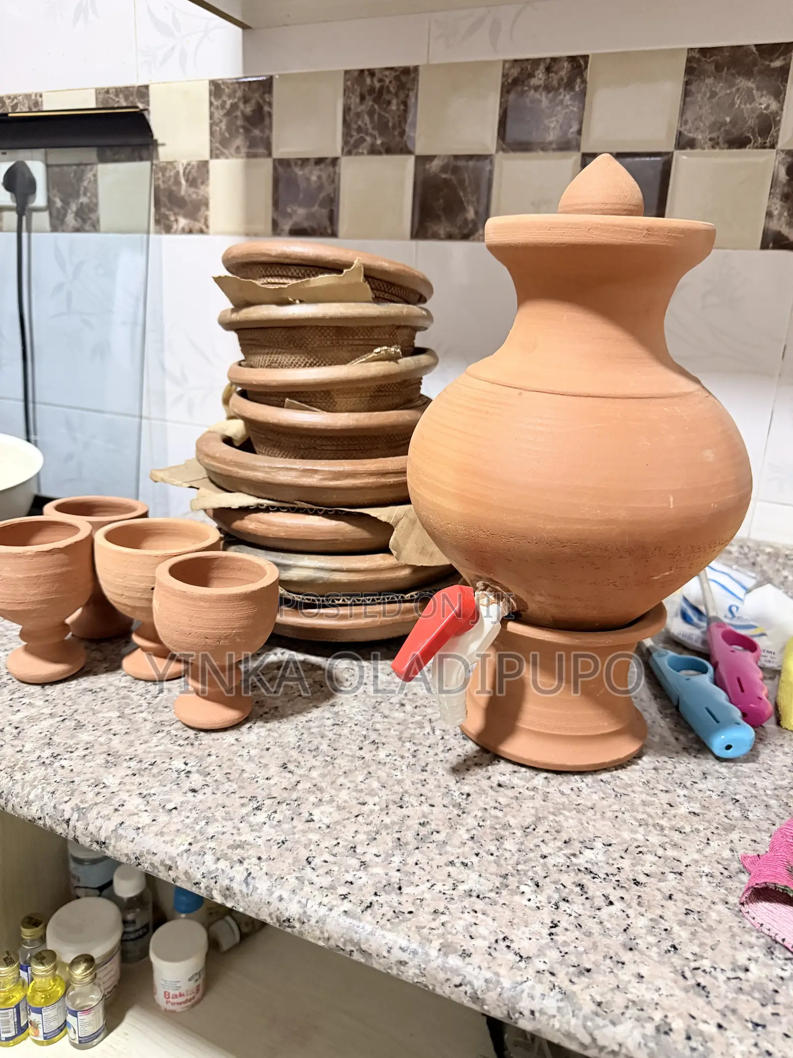 Clay Water Dispenser, Saucers and Cups