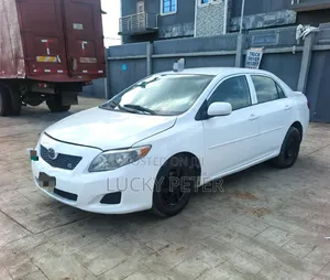 Toyota Corolla LE 4dr Sedan (1.8L 4 cyl 4A) 2009 White