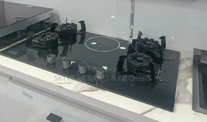 Modern Black Glass Gas Cooktop 
4 Gas 1 Electric Burners
