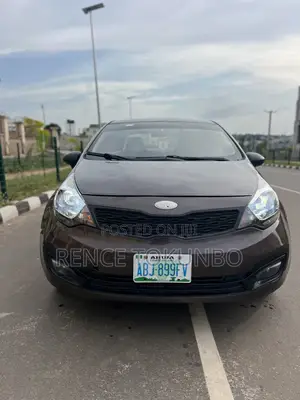 Kia Rio LX 4dr Sedan (1.6L 4cyl 6M) 2013 Brown
