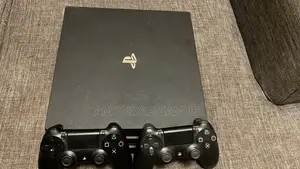 PS4 Pro Console and Pads With 11 Games
