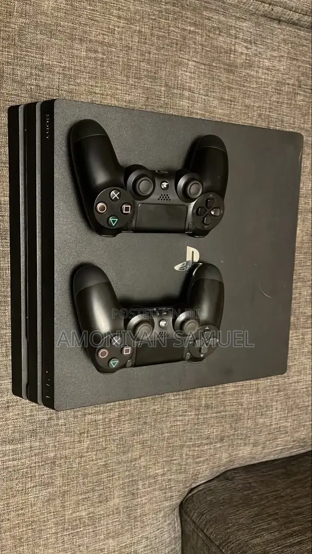 PS4 Pro Console and Pads With 11 Games