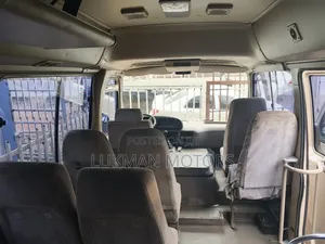 Toyota Coaster 2022 Brown