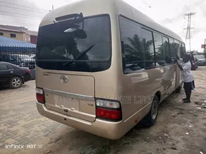 Toyota Coaster 2012 Gold