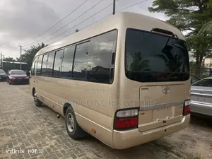 Toyota Coaster 2012 Gold