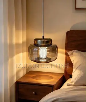 Pendant Light Features Smoky Glass Light