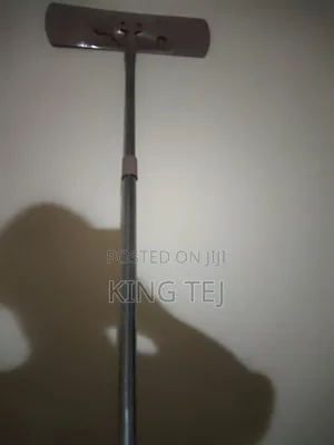 Mop Stick Used to Mop Floor