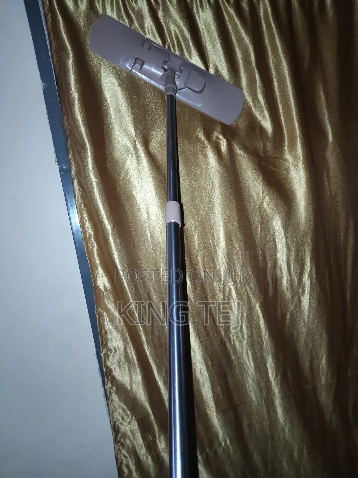 Mop Stick Used to Mop Floor