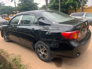 Toyota Corolla Base 4dr Sedan (1.8L 4cyl 5M) 2009 Black