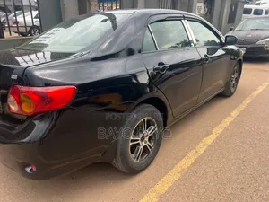 Toyota Corolla Base 4dr Sedan (1.8L 4cyl 5M) 2009 Black